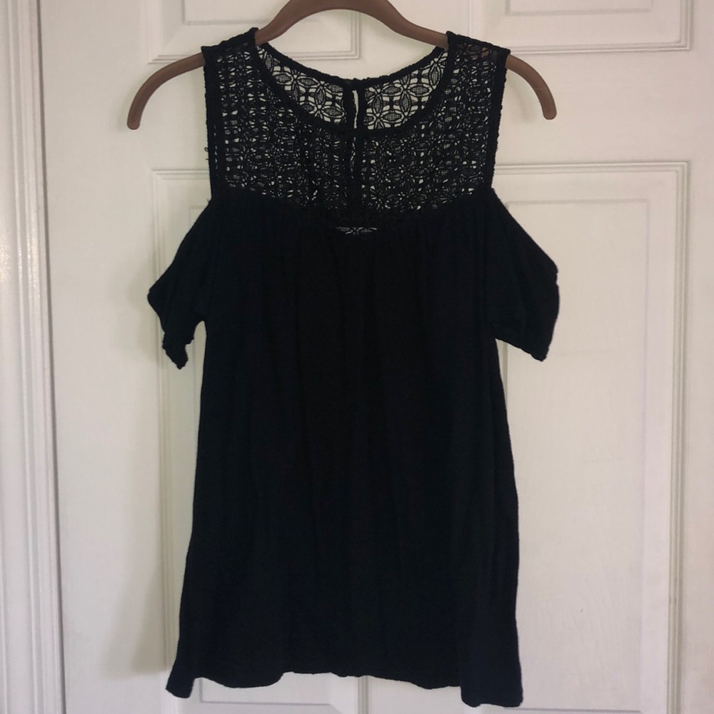 Black top with laced details near neckline